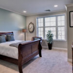 Memory care residents enjoy privacy in their own room—each identified by an elegant memory box filled with personal photos and mementos