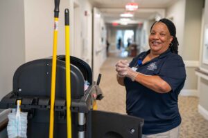 Our dedicated employee working hard to provide a clean area for community members.
